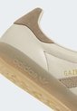 Tenis Lifestyle adidas Originals Gazelle Indoor Beige de adidas Performance