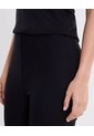 Pantalón Flare Tela Técnica Fluida Para Mujer  Deportiva  Color Negro Marca Atmos de Atmos