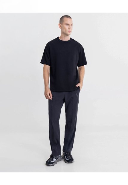 Pantalón Bota Recta Smartech Training  Para Hombre Negro Atmos