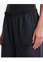 Pantalón Parachute Microcomfort Para Mujer  Deportiva  Color Negro Marca Atmos de Atmos