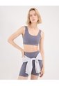Top Soporte Medio Con Cut Out Aerius Skin  Para Mujer Gris Atmos de Atmos
