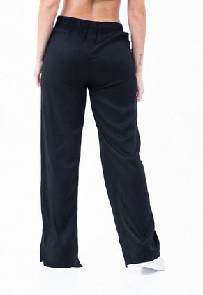 Pantalón Amplio Negro Con Aberturas En Botas Para Mujer