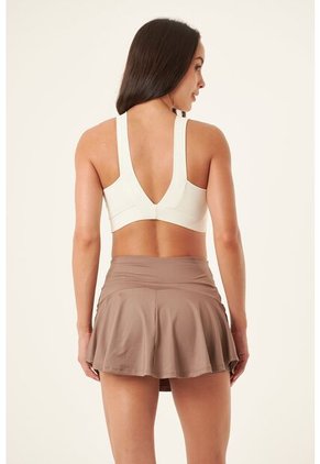 Top Deportivo Ivory Con Escote En Espalda Para Mujer