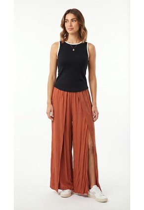 Pantalón Naranja Para Mujer Con Abertura