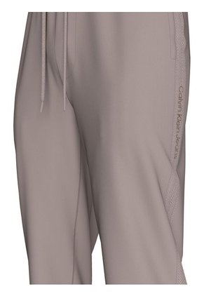 Jogger Beige Deportivo Con Logo Y Cinta Calvin Klein