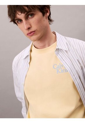Camiseta Amarilla Holgada Con Logo Gráfico Con Letras Calvin Klein