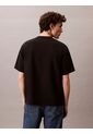 Camiseta Negra Holgada Con Logo Gráfico Con Letras Calvin Klein de Calvin Klein