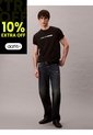 Camiseta Negra Con Logo Gráfico Apilado Calvin Klein de Calvin Klein
