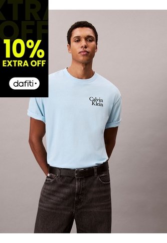 Camiseta Celeste Holgada Con Logo Gráfico Con Letras Calvin Klein Calvin Klein