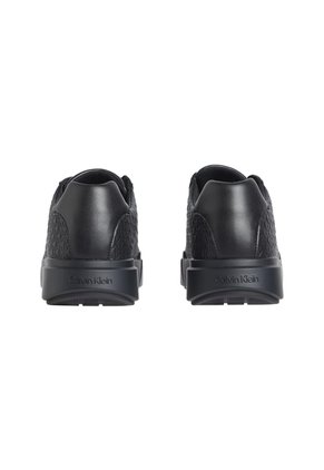 Tenis Negro Con Suela Gruesa Y Estampado De Monograma En Relieve Calvin Klein