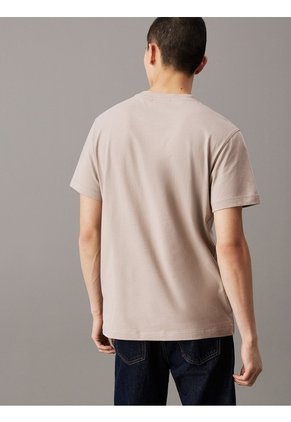 Camiseta Beige Con Logo En La Cinta Calvin Klein