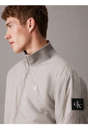 Chaqueta Gris De Nailon Acolchado Con Cremallera Calvin Klein