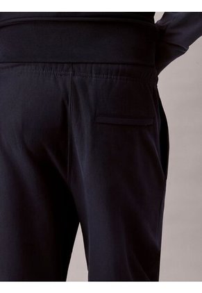 Jogger Azul En Tejido Terry Premium Con Monograma Bordado Calvin Klein