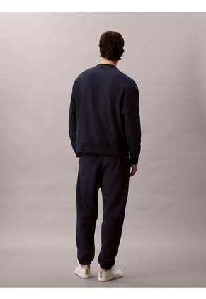 Jogger Azul En Tejido Terry Premium Con Monograma Bordado Calvin Klein