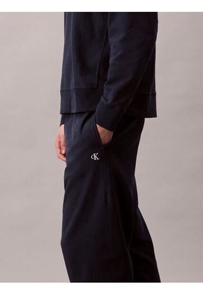 Jogger Azul En Tejido Terry Premium Con Monograma Bordado Calvin Klein