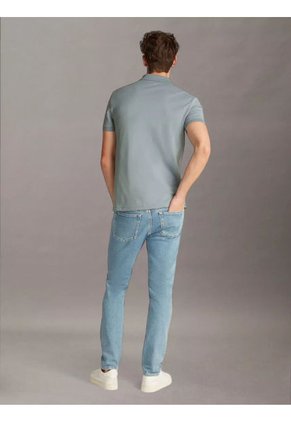 Polo Azul Con Monograma Calvin Klein