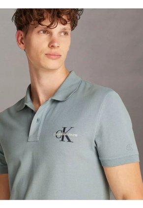 Polo Azul Con Monograma Calvin Klein