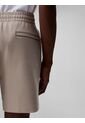 Pantaloneta Beige De Punto De Canalé Con Monograma Bordado Calvin Klein de Calvin Klein