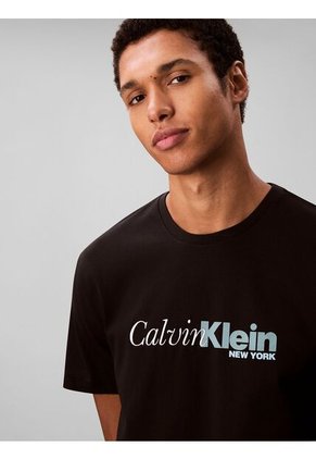 Camiseta Negra Con Estampado Gráfico De Logo En Letra Cursiva Calvin Klein