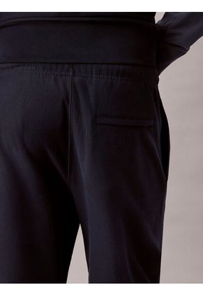 Jogger Azul En Tejido Terry Premium Con Monograma Bordado Calvin Klein