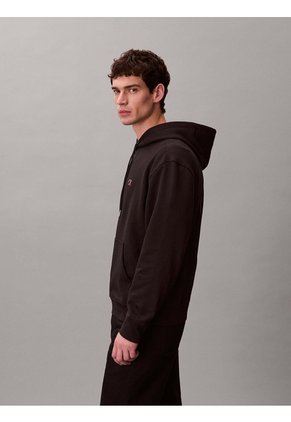 Buzo Negro Con Gráfico Circular De Logo Calvin Klein