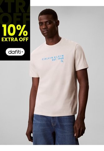 Camiseta Beige Con Gráfico De Logo Calvin Klein Calvin Klein