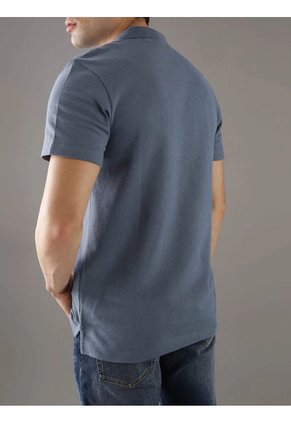 Polo Azul Textured Con Monograma Calvin Klein