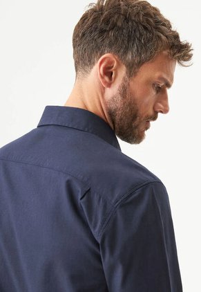Polo CHEVIGNON Azul
