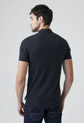 Polo CHEVIGNON Negro