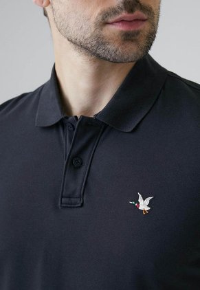 Polo CHEVIGNON Negro