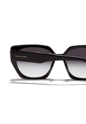 Gafas De Sol Hawkers Hombre Y Mujer BOUJEE. Negro