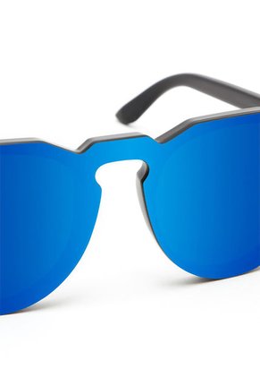 Gafas De Sol Hawkers Hombre Y Mujer WARWICK VENM HYBRID. Negro/Azul