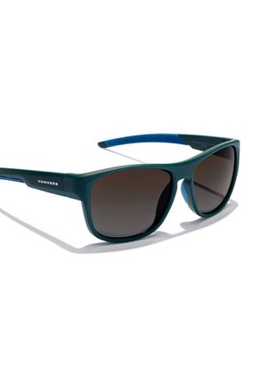 Gafas De Sol Hawkers Hombre Y Mujer GRIP. Azul/Azul