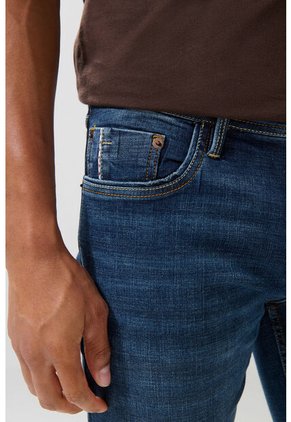 Jean Skinny Tiro Bajo Azul Oscuro Ajustado Con Bolsillos