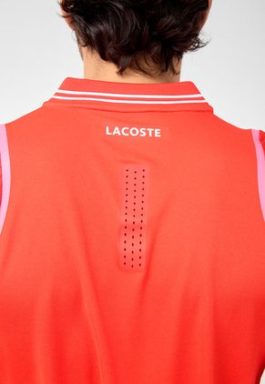 Polo LACOSTE Tennis × Daniil Medvedev Naranja
