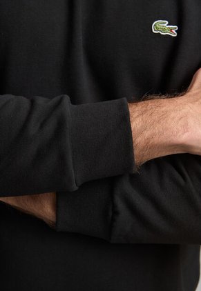 Buzo LACOSTE Negro