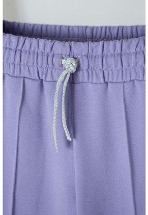 Jogger De Mic Bota Ancha Morado Para Niña 4