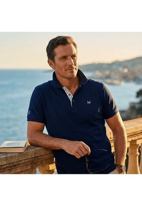 Camiseta Polo Emblema Azul Tierra Arriba Camiseta Polo Emblema Azul Tierra Arriba Talla S