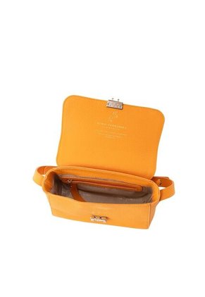 Manos Libres Con Tapa Monograma Curcuma Solon Hernández Manos Libres Con Tapa Monograma Curcuma Solon Hernández