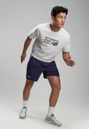 Pantaloneta new balance Tournament Azul