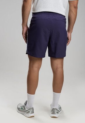 Pantaloneta new balance Tournament Azul