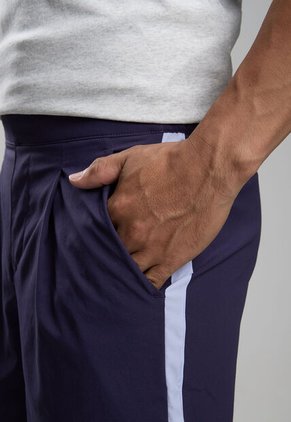 Pantaloneta new balance Tournament Azul