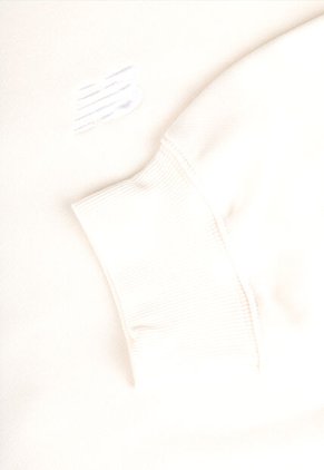 Buzo new balance Sport Essentials Beige Claro