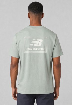 Camiseta new balance Woven Label Verde