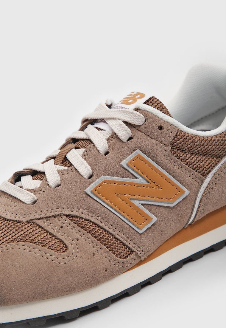 New balance 373 cuero Marrón online