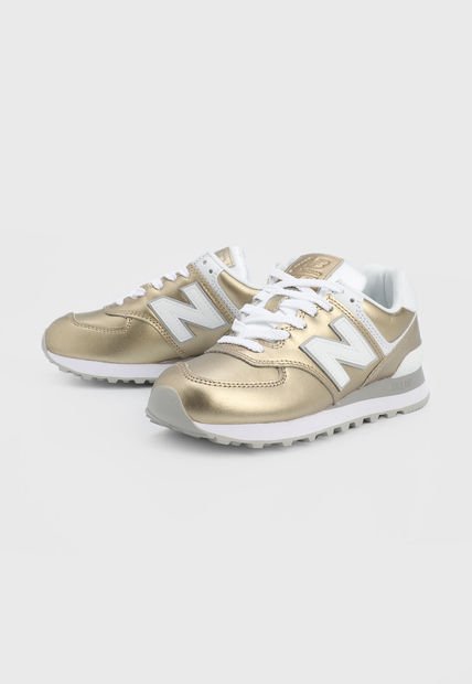 Tenis new balance on sale dorado