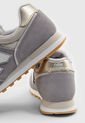 Tenis Lifestyle Gris-Beige-Dorado New Balance 373 de New Balance