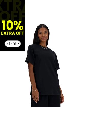 Camisa Deportiva New Balance Originals Athletics Negro Mujer