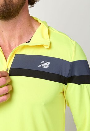 Buzo new balance Accelerate Amarillo Neón