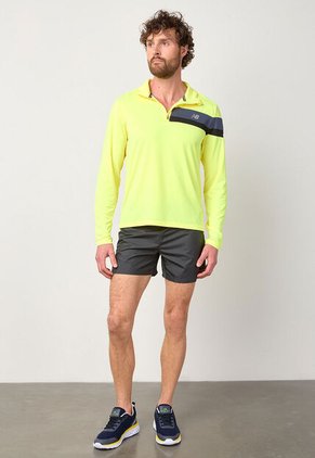 Buzo new balance Accelerate Amarillo Neón